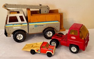 lot 176 image: Lot of 3 Vintage Tonka Toy Trucks with Bell System Utility Truck