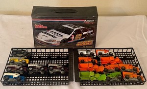 lot 193 image: Hot Wheels Oshkosh Snow Plow Diecast Truck Lot with Collector Case
