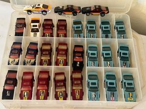 lot 194 image: Collection of 27 Vintage Hot Wheels Camaro Diecast Cars in Storage Case