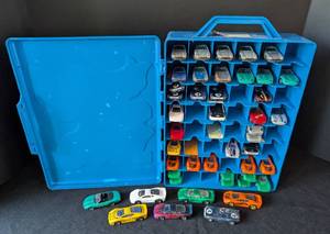 lot 312 image: Hot Wheels 48 Car Carrying Case of Vintage Hot Wheels Jaguar Cars