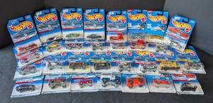 lot 333 image: Thirty New Hot Wheels Single Car Packs