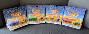 lot 337 image: Four Hot Wheels Holiday Collectable Cars