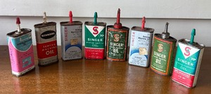 lot 510 image: Vintage Sewing Oil Cans by Singer, Kenmore and Penneys