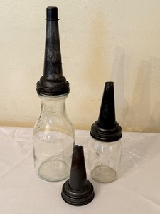 lot 41 image: Set of 2 Vintage Glass Mobil Oil Bottles with Metal Spouts - The Master MFG Co.