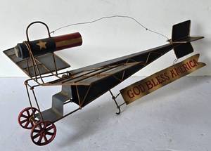 lot 597 image: Vintage Metal Plane Replica
