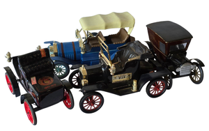 lot 605 image: Set of Four Jim Beam Vehicle Replica Decanters