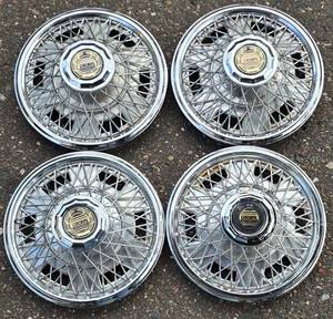 lot 654 image: Set of Four Rocket Hub Caps