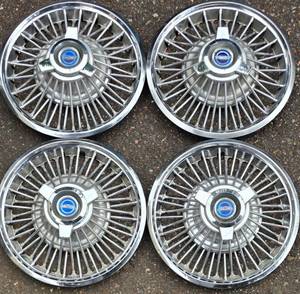 lot 301K image: Set of Four Ford Mustang Fairlane Hubcaps