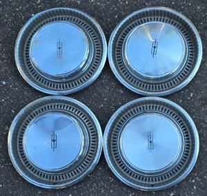 lot 663 image: Set of Four Wheel Covers  Hub Caps
