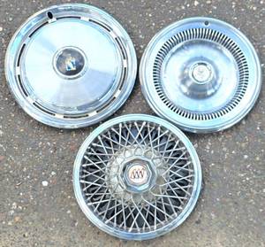 lot 674 image: Three Vintage Buick Hub Caps