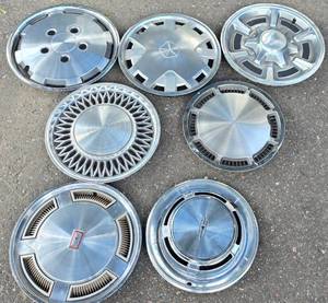 lot 697 image: Variety of Wheel Covers  Hub Caps by Multiple Makers