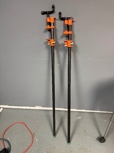 lot 55 image: Two Pipe ClampsBar Clamps  48 Long