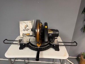 lot 30 image: Pro-Tech 10 Compound Mitre Saw. Includes Extension Arms, Stop Fence Plate and Clamp Assembly, Instruction Book