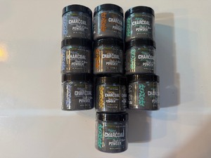 lot 91 image: 10 Natural Activated Charcoal Tooth and Gum Powder (Organic Contents) 3 Peppermint, 4 Spearmint, 2 Cinnamint and 1 Orange