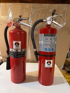 lot 23 image: Two Charged Fire Extinguishers