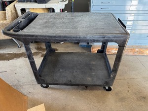 lot 27 image: Black Rubbermaid Rolling Cart, Excellent Condition (44 X 25 x 33)