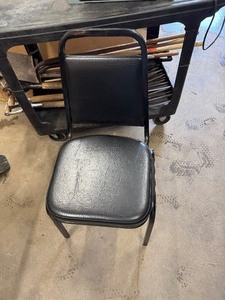 lot 39 image: 4 Beautiful Black Stackable Cushioned Chairs