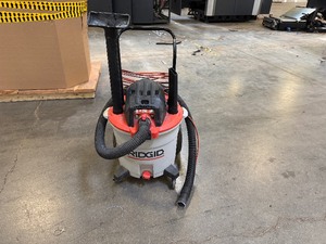 lot 5 image: Heavy Duty Rigid 16 Gallon WetDry Vac. 6.5 HP Includes attachments.