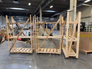 lot 6 image: Three All-Purpose Rolling Wood Utility Racks