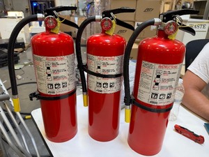 lot 54 image: Three Red Fully Charged Fire Extinquishers