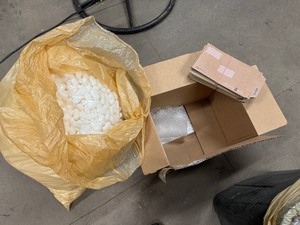 lot 64 image: Large Bag of Packing Peanuts US, a Few Ready Post Envelopes and a Couple Sheets of Bubble Wrap