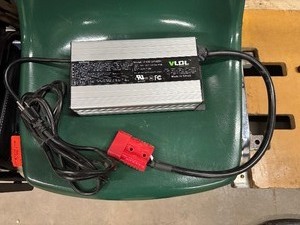 lot 65 image: VLDL Smart Battery Charger - Model VL900-LP2425V. Input 100-120V - 10A Max 60HZ