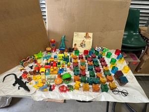 lot 100 image: Vintage Childrens Toys - Fisher Price, Rubiks Cubes, Sesame Street, Vintage Building Toys and More