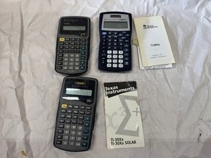 lot 102 image: Three Texas Instruments Calculators Two ti-30xa and One ti-30 xIIs