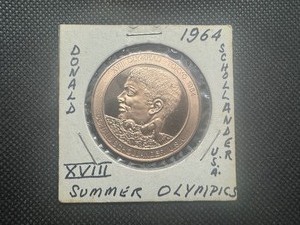 lot 17 image: 1964 USA XVII Summer Olympics Commemorative Medal. Schollander Wins Four Gold Medals for USA Swimming