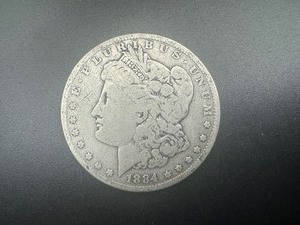 lot 35 image: 1884 Circulated Morgan Dollar