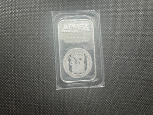 lot 51 image: APMEX 1 oz .999 Fine Silver Bar. Original sealed sleeve.
