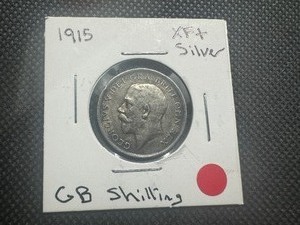 lot 63 image: 1915 WW1 Era British Silver Shilling. XF Spectacular Patina. Very Beautiful Coin