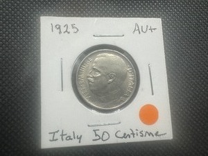 lot 87 image: 1925 AU Italian 50 Centisme. Very lightly circulated. Satin luster and gorgeous engraving.