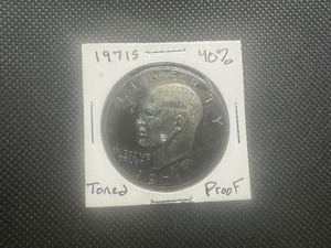 lot 95 image: 1971 S 40% Proof Silver Ike Dollar Toner.  Appears uncirculated, stunning bronze bluegreen toning