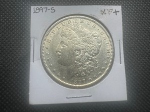 lot 99 image: 1897 S XF Morgan Dollar. Uncleaned. Solid XF with partial mint luster. Problem free.