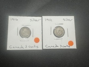 lot 106 image: (2) Silver Canadian Nickels. Both lightly circulated with partial mint luster. Uncleaned and problem free.