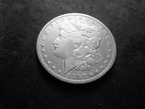 lot 20 image: 1897 O Morgan Silver Dollar