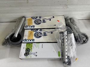 lot 72 image: Lot of Mixed Brand Walker Wheels (Drive, McKesson) Adjustable Non-Skid Rubber Wheels, Swivel Lock - Excellent Condition
