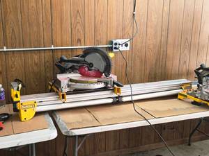 lot 754 image: DeWalt 10 Compound Miter Saw DW713 with DeWalt DWX723 HD Miter Saw Stand