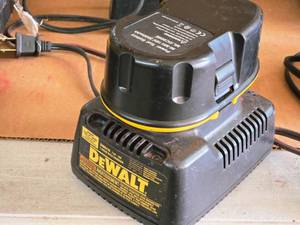 lot 764 image: DeWalt 7.2V-18V 1-Hour NiCd Battery Charger DW9116 with 18V 3600mAh Ni-MH Battery DC9096