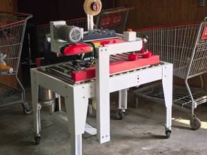 lot 631 image: Cleveland Box Taping Machine CE-554TS
