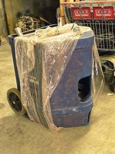 lot 715 image: Home Plate Pitching Machine