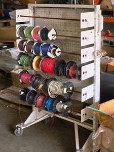 lot 726 image: Rolling Rack with Assorted Electrical Wire on spools 20 x 40 x 60