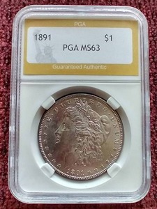 lot 8 image: 1891 Morgan Dollar - PGA MS63