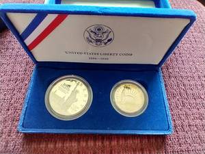 lot 25 image: 1986 Liberty Proof Silver Dollar & Clad Half Dollar Set