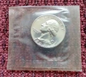 lot 33 image: 1963 Uncirculated Silver Quarter