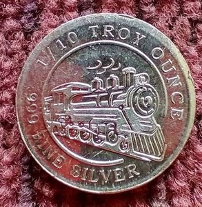 lot 38 image: 110th oz Silver Round
