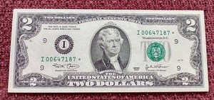 lot 51 image: Uncirculated 2003 $2 Star Note