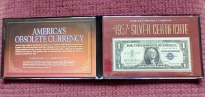 lot 102 image: Silver Certificate $1 Note in Folder