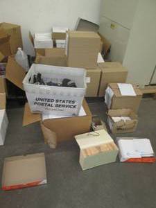 lot 193 image: Pallet of shipping supplies and branded envelopes